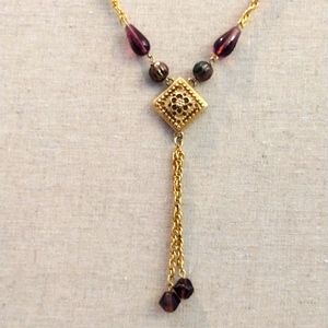 LR faux gold chain necklace with faux amethyst beads faux gold pendant.